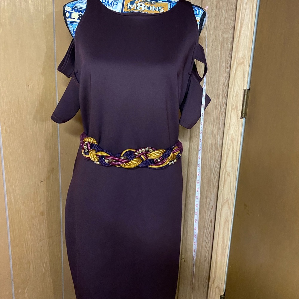 Burgundy dress detail of sleeves cut off detail